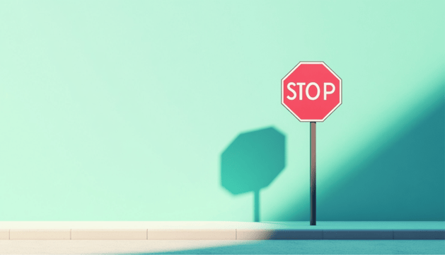 A stop sign on a pastel background